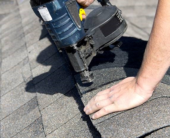 General roof repair addressing shingles and leaks