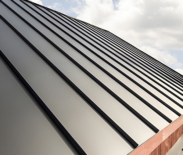 Metal roofing material installed on home