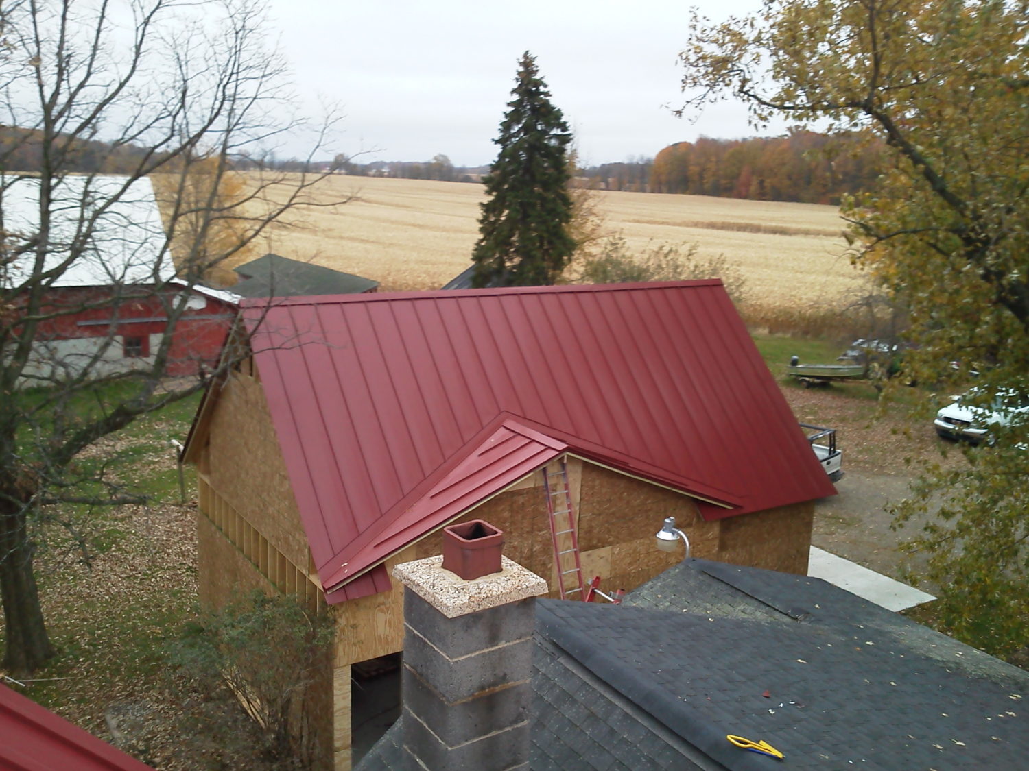 Red Metal Roof on Garage